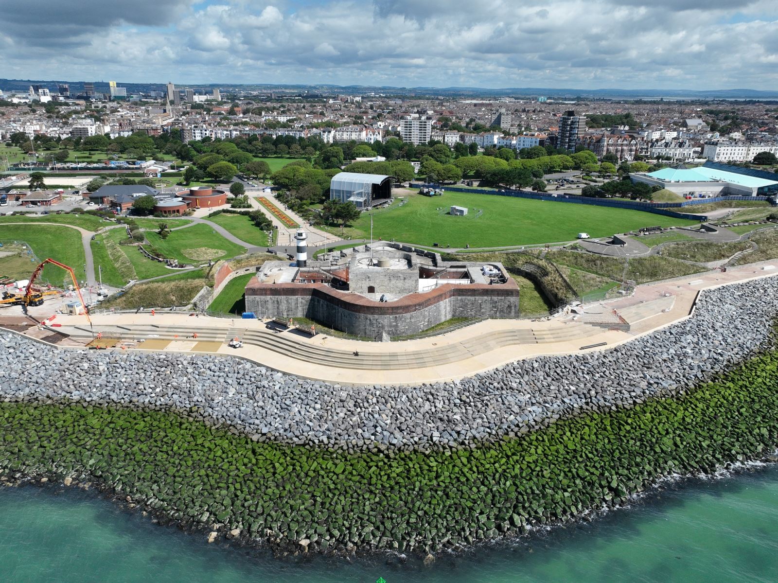 Aerial view of the Theatre of the Sea in front of Southsea Castle, with Southsea, Portsmouth and beyond in the background