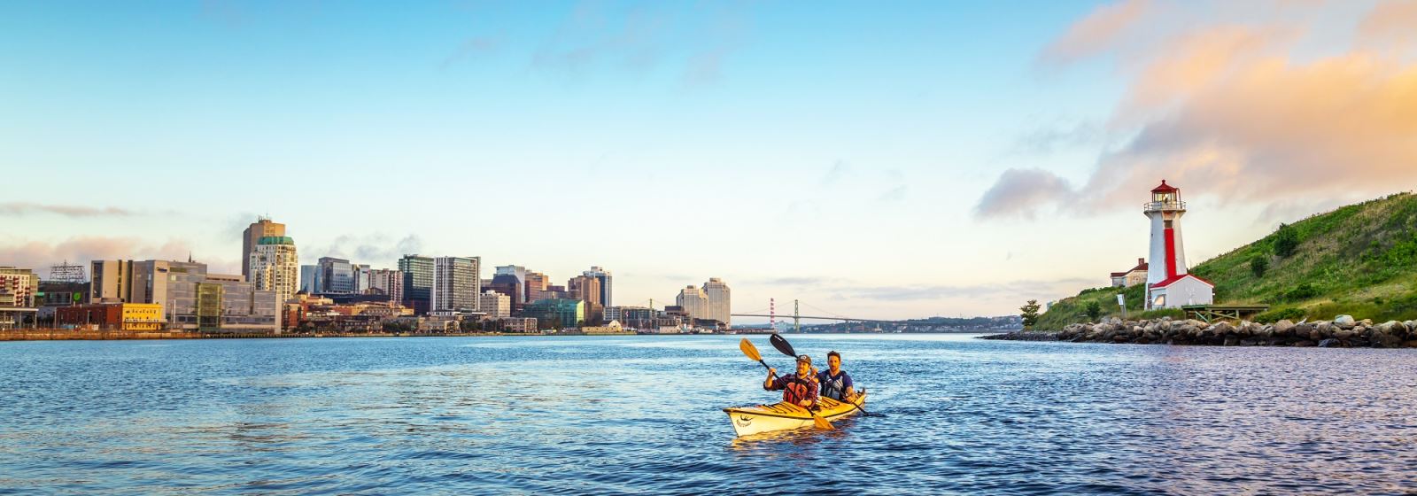 The Halifax cityscape with two people in a canoe